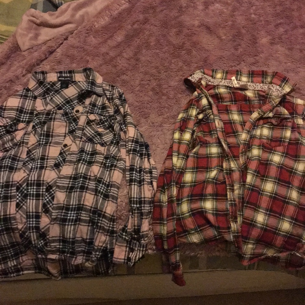 I am selling two plaid button down shirts